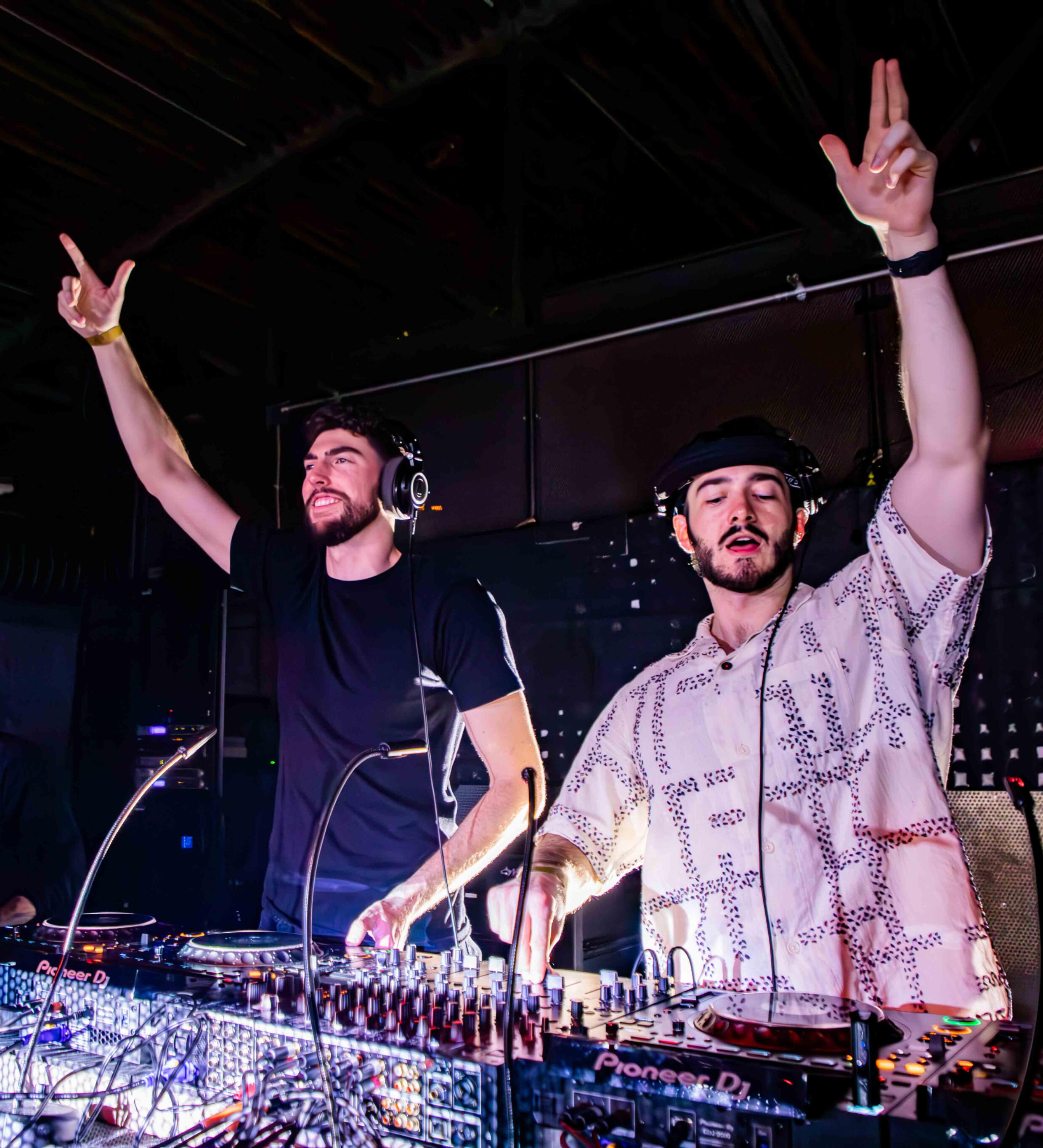 Saint Stratus, a DJ duo, playing music at a nightclub
